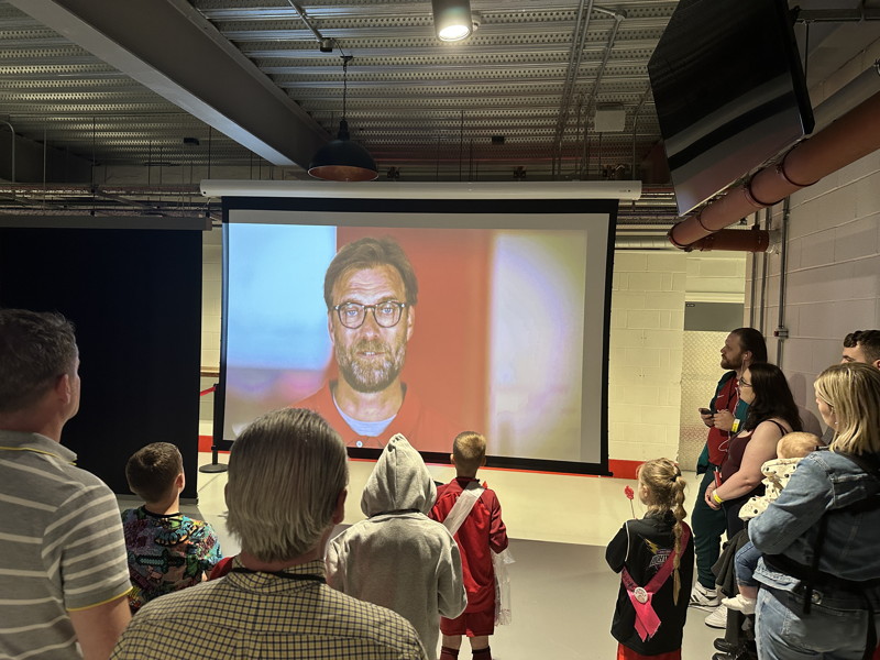 jurgen klopp video on projector during anfield stadium tour