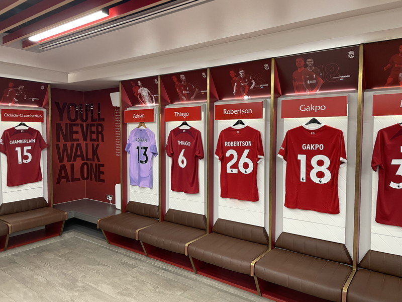 liverpool fc home dressing room shirts hung up