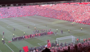 players line up in front of kop for ynwa after liverpool win league agains tottenham 2025