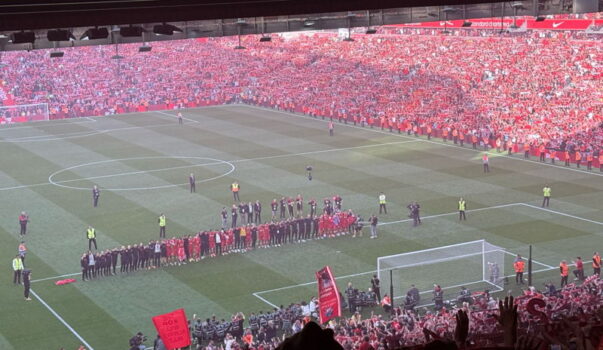 players line up in front of kop for ynwa after liverpool win league agains tottenham 2025